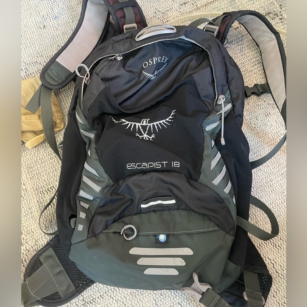Osprey escapist 18 backpack - plus water reservoir. Used